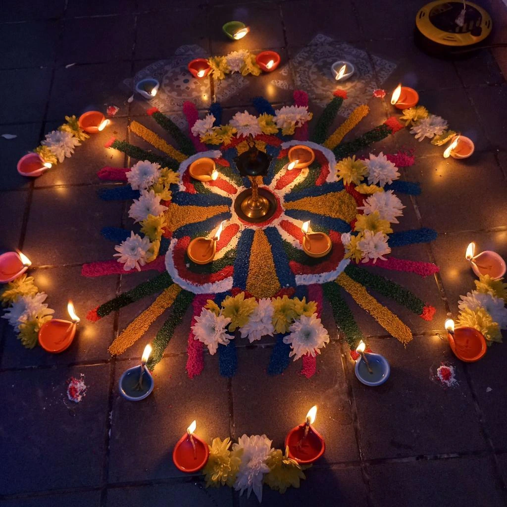 Traditional Diwali symbols including diyas, Lakshmi-Ganesha worship and Festival of Lights rituals.